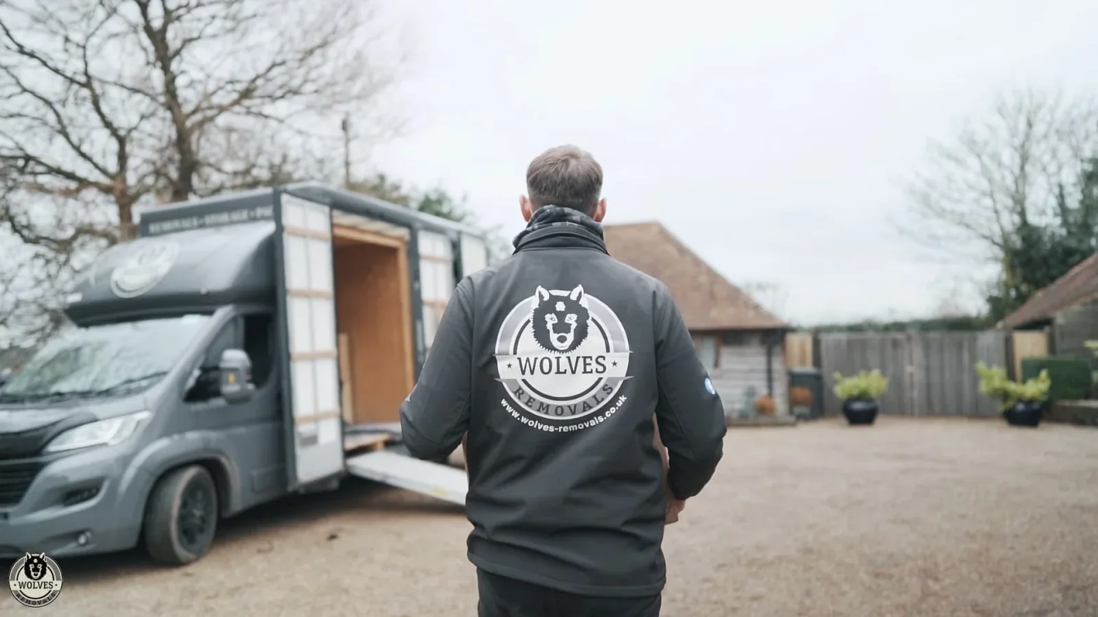 Wolves Storage Sussex team member walking to the Luton van on a managed collection in West Sussex